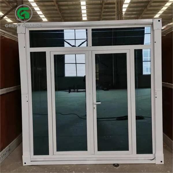 Casa de contenedores plegables prefabricada de acero puerta de vidrio pared marrón disponible para alquiler