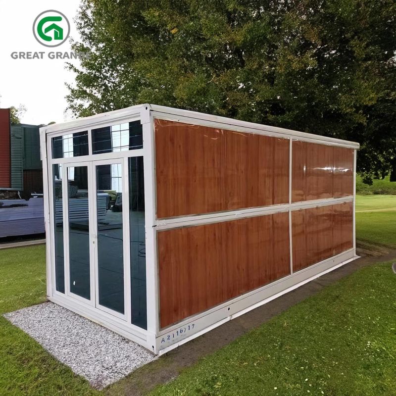 Casa de contenedores plegables prefabricada de acero puerta de vidrio pared marrón disponible para alquiler
